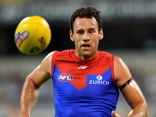 Cameron Pedersen on the ball for Melbourne in 2018, his last season in the AFL.