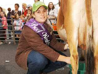 Beef royalty: 2009 Beef Week Queen Kassandra Whitney takes part in the milking competition at the Casino Beef Week Breakfast With the Butchers morning.