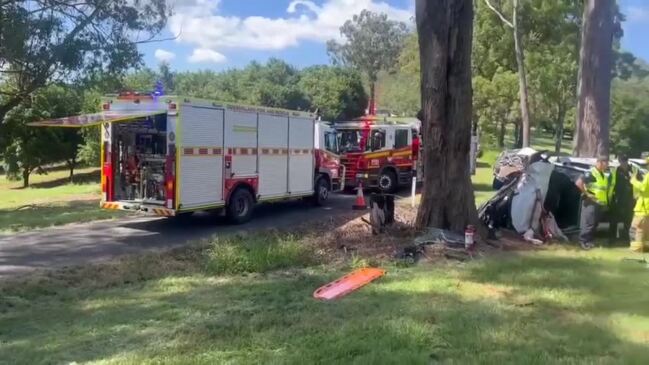 Man freed from wreckage after car hits tree