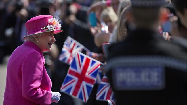 Queen Elizabeth II smiles as she arrives to open a bandstand at Alexandra Gardens in Windsor, west of London. Picture: AFP