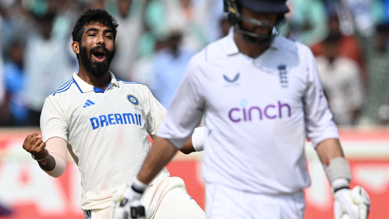 TOPSHOT - India's Jasprit Bumrah celebrates after taking the wicket of England's Ben Foakes in Visakhapatnam. Picture: Dibyangshu Sarkar / AFP.