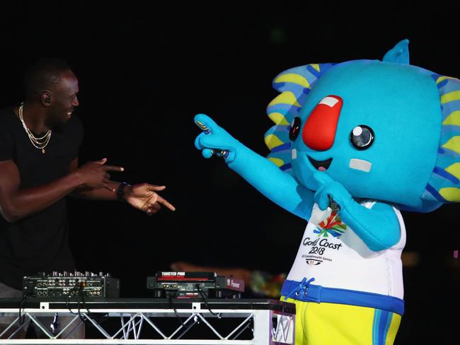 Jamaica’s Usain Bolt and Commonwealth Games 2018 mascot Borobi. Picture: Getty