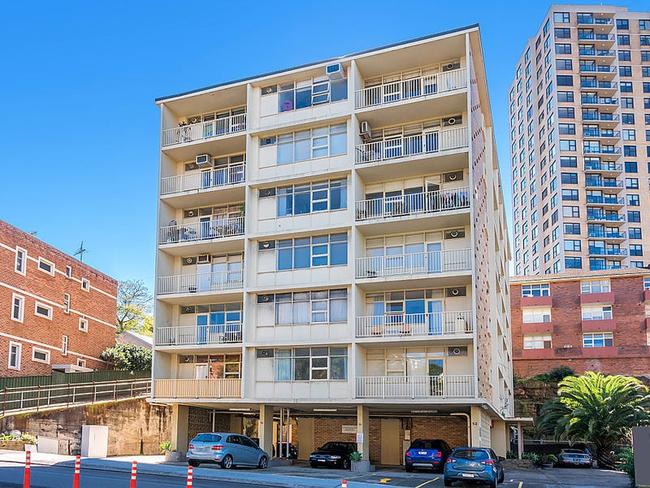 An angry Scott Griffin hurled furniture, and other items, from his fifth-floor balcony at North Sydney, nearly hitting passers-by. Picture: Supplied