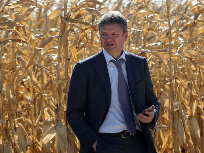 Former Russian agriculture minister Alexander Tkachev attends a meeting with farmers in a corn field in Semikarakorsk, Russia, in 2015.