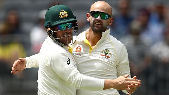 Nathan Lyon and Aaron Finch celebrate after Lyon took the wicket of Ajinkya Rahane. Picture: Getty Images