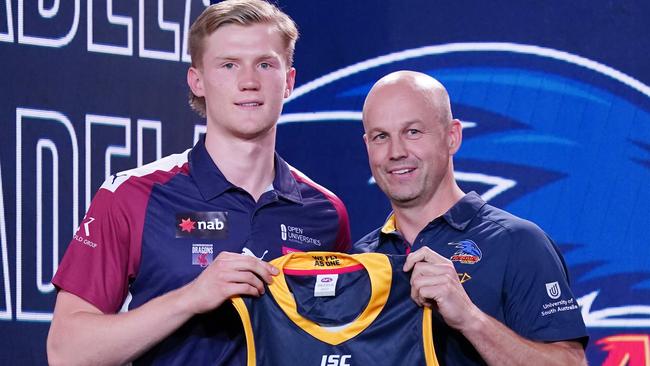 Fischer McAsey presented with his Crows jumper by coach Mathew Nicks at the 2019 draft. Picture: AAP Image/Michael Dodge