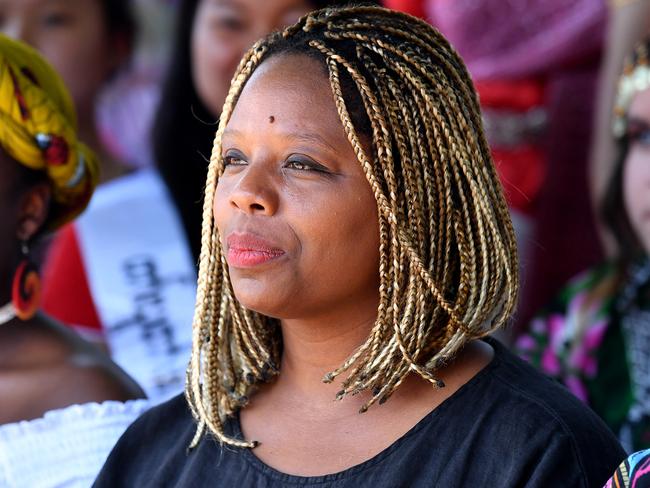 Co-founder of the Black Lives Matter movement Patrisse Cullors poses for a photo with students at Cabramatta High School in Cabramatta, Sydney, Monday, Oct. 30, 2017. The school is hosting the 2017 Sydney Peace Prize winners, Alicia Garza, Patrisse Cullors and Oal Tometi. (AAP Image/Joel Carrett)