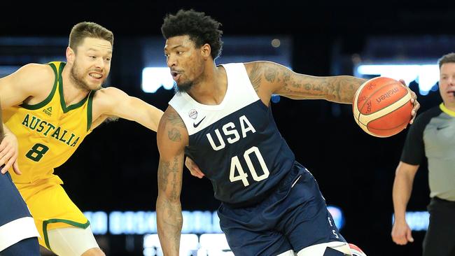 Marcus Smart of Team USA moves past the Boomers’ Matthew Dellavedova on Saturday night. Picture: Mark Stewart