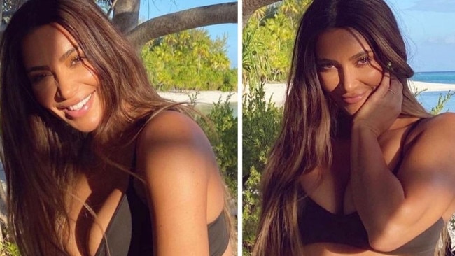 Kim Kardashian flaunts fit figure in low-cut bra and bike shorts on beach. Picture: Instagram/Skims