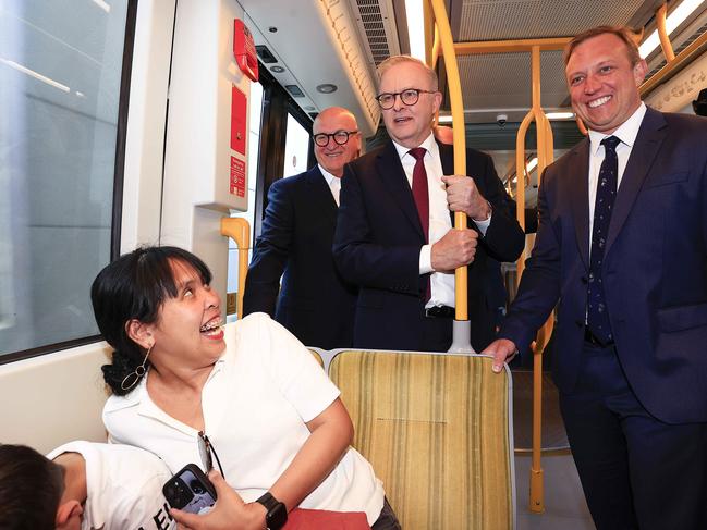 Premier Steven Miles and Prime Minister Anthony Albanese ride on the light rail on the Gold Coast. Pics Adam Head