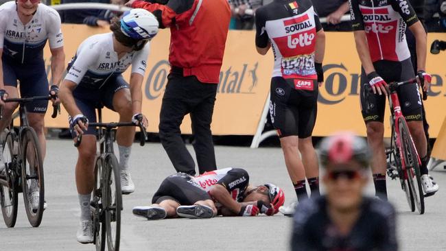 Caleb Ewan reacts after falling close to the finish line of the third stage of the Tour de France. Picture: Christophe Ena / AFP