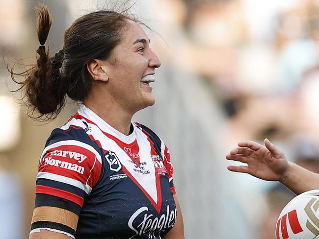 SYDNEY, AUSTRALIA - OCTOBER 06:  Olivia Kernick of Roosters celebrates with team mates after scoring a try during the NRLW Grand Final match between Sydney Roosters and Cronulla Sharks at Accor Stadium on October 06, 2024, in Sydney, Australia. (Photo by Cameron Spencer/Getty Images)