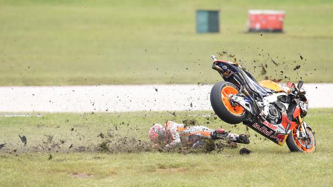 Marc Marquez crashes out of the 2016 Australian MotoGP in dramatic fashion. Picture: AAP