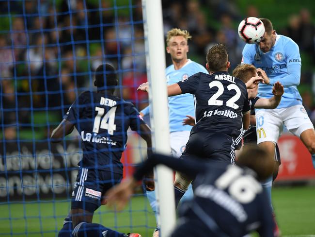 Dario Vidosic of City (second from right) scores a goal in injury time during the Round 9 A-League match between Melbourne City and Melbourne Victory at AAMI Park, in Melbourne, Saturday, December 22, 2018. (AAP Image/Julian Smith) NO ARCHIVING, EDITORIAL USE ONLY