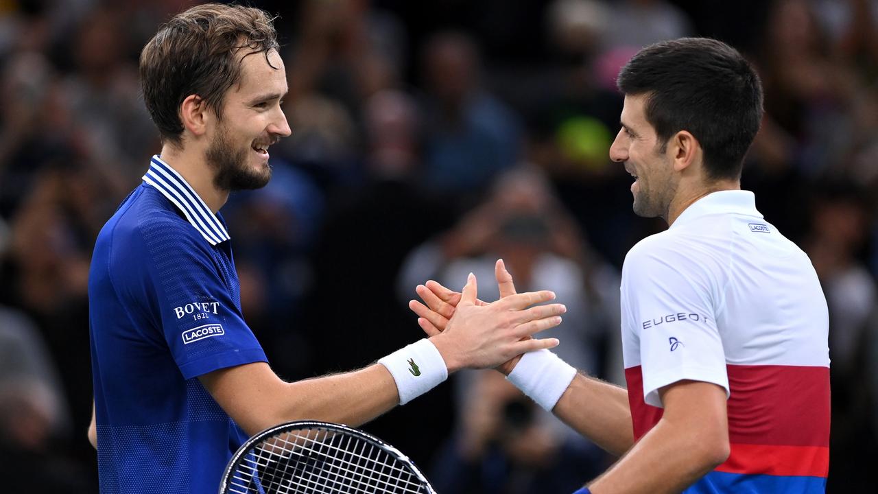 PARIS, FRANCE - NOVEMBER 07: Novak Djokovic of Serbia shakes hands at the net after winning the mens singles final against Daniil Medvedev of Russia on day seven of the Rolex Paris Masters at AccorHotels Arena on November 07, 2021 in Paris, France. (Photo by Justin Setterfield/Getty Images)