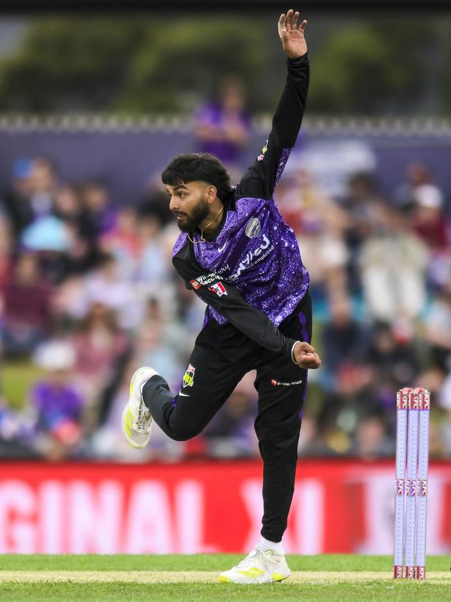 Nikhil Chaudhary of the Hurricanes bowls during the BBL match between Hobart Hurricanes and Sydney Thunder at Blundstone Arena, on January 01, 2024, in Hobart, Australia. (Photo by Simon Sturzaker/Getty Images)