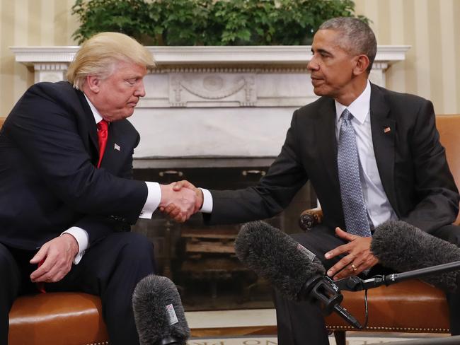 President Barack Obama and President-elect Donald Trump shake hands following their meeting in the Oval Office of the White House in Washington. Picture: Pablo Martinez Monsivais