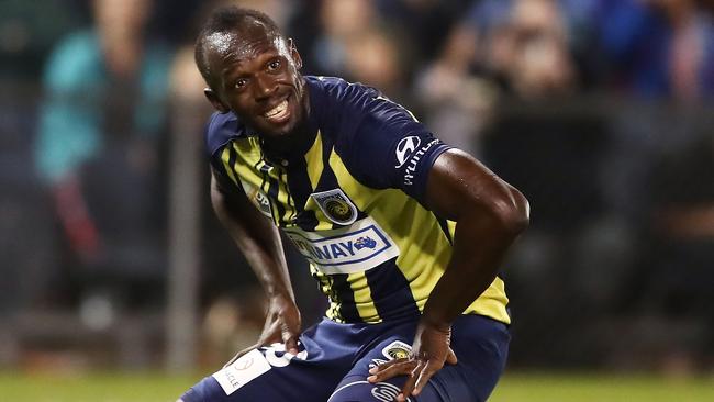 Usain Bolt looks on during the pre-season friendly match between the Central Coast Mariners and Macarthur South West United at Campbelltown Sports Stadium on October 12.