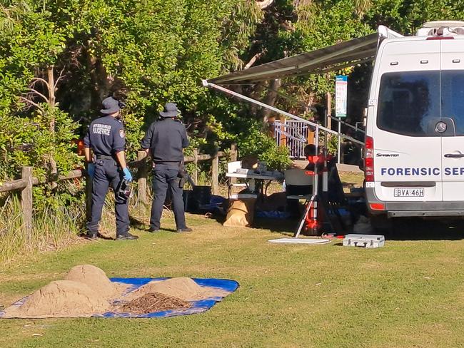 Forensic police at the Coffs Harbour scene where human remains were found on Tuesday. Picture: Toni Moon.