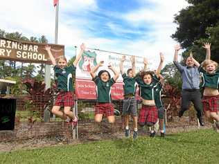 JUMP TO IT: Burringbar Principal Peter Halloran with students Abi, Lonnie, Amber, Flynn, Ethan and Charlie get in the spirit of the upcoming 125th school reunion. Picture: Scott Powick