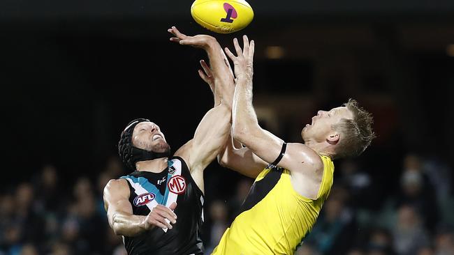 Brad Ebert goes back with the flight of the ball in last year’s preliminary final - his last act in the AFL. Picture: Ryan Pierse/Getty Images