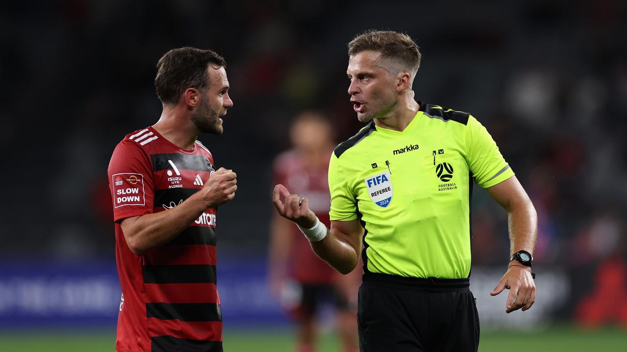 Star import Juan Mata talks to referee Alex King. Picture: Getty