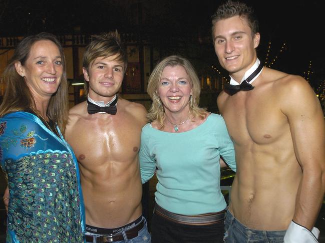 Even politicians enjoyed The Cross’s raucous reputation. Former NSW Liberal leader Kerry Chikarovski (centre) with bare-chested waiters during Ladies Night at The Bourbon in 2005.