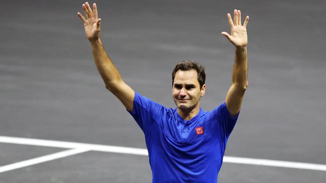 Federer waves to the crowd.