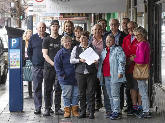 North Hobart business owners and customers who will send a petition with more than 1000 signatures to the Hobart City Council over parking woes in the busy strip. Picture: Chris Kidd