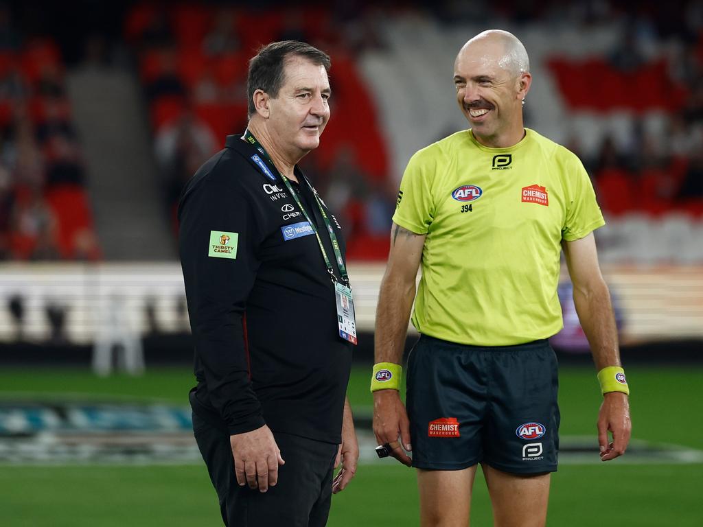 Ross Lyon speaks with Mathew Nicholls during the clash with Brisbane. Picture: Michael Willson/AFL Photos via Getty Images.
