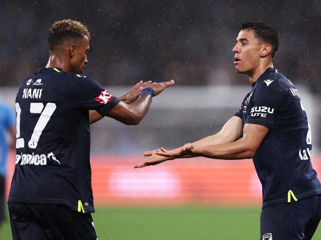 Nani (left) congratulates Chris Ikonomidis for scoring a goal for the Victory. Picture: Matt King/Getty Images