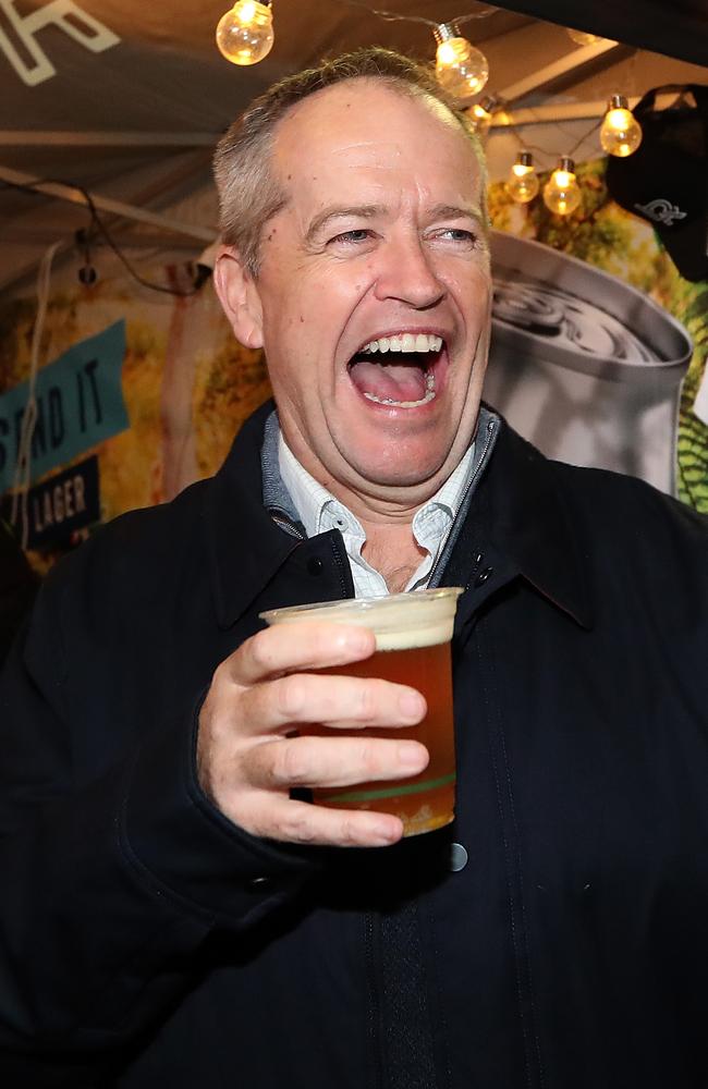 Shorten having a beer with Member for Bass, Ross Hart, in Tasmania. Picture: Kym Smith