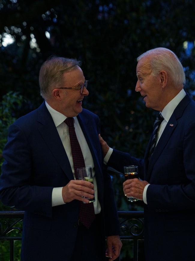 Mr Albanese also shared a picture of he and President Biden sharing drinks.