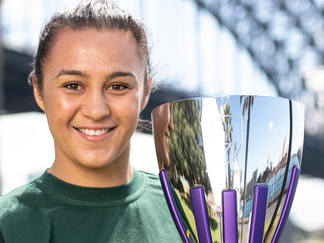 Corban McGregor poses for a portrait with the Downer Rugby League World Cup Nines Trophy in Sydney, Wednesday, October 9, 2019. The Downer Rugby League World Cup Nines Sydney 2019 will feature 12 nations playing over the course of the 18th and 19th October 2019 at the Bankwest Stadium in Western Sydney. (AAP Image/James Gourley) NO ARCHIVING