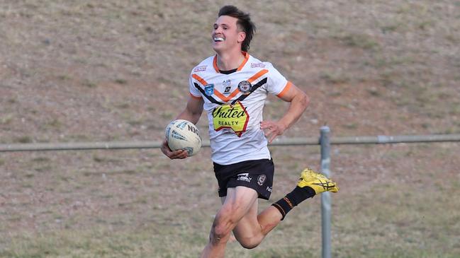 Daniel Payne on his way to the top of the try scoring chart. Picture: Steve Montgomery