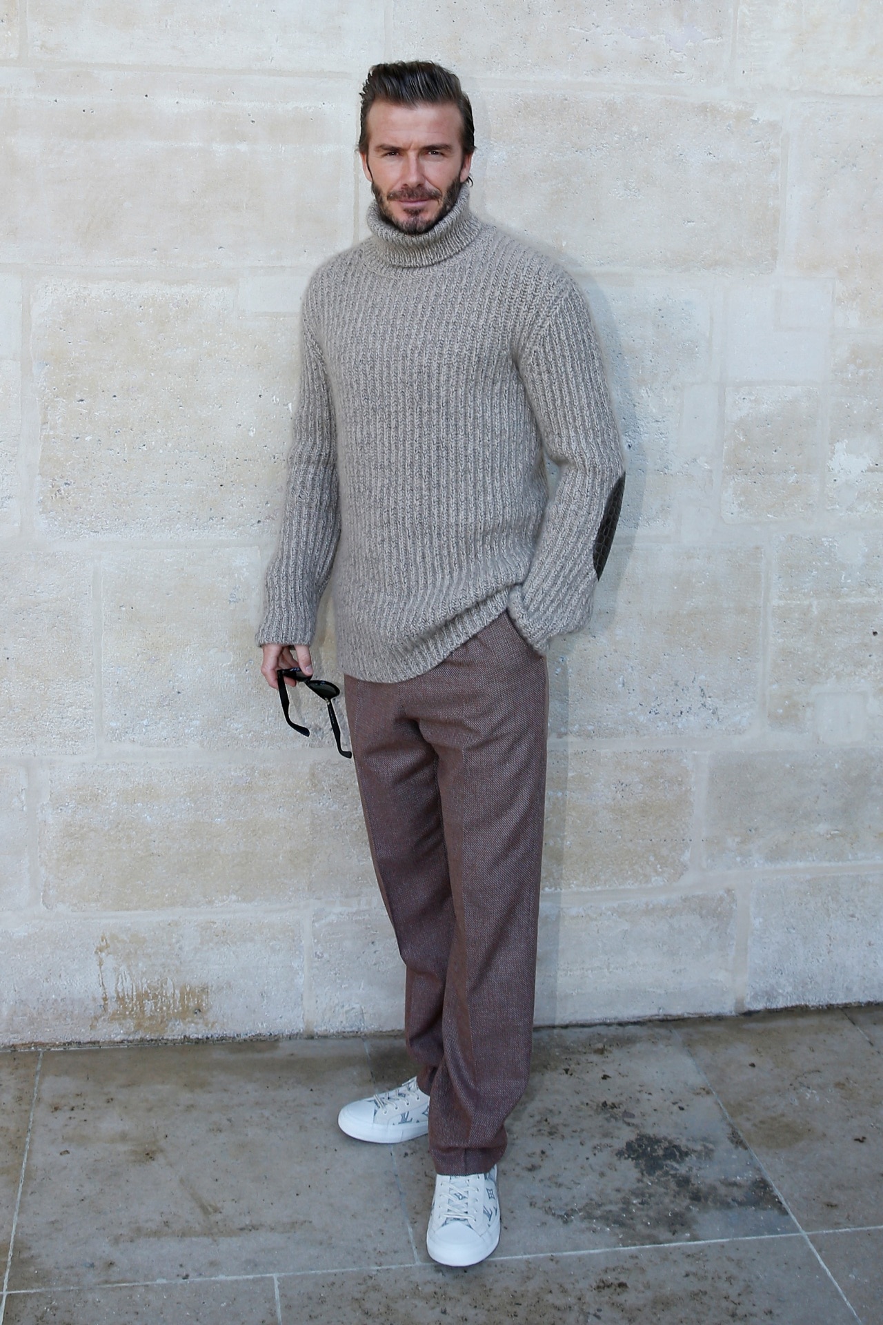 <h2>2017</h2><p>&nbsp;</p><p>An oversized turtleneck moment. Beckham knows his shades of brown well. </p>