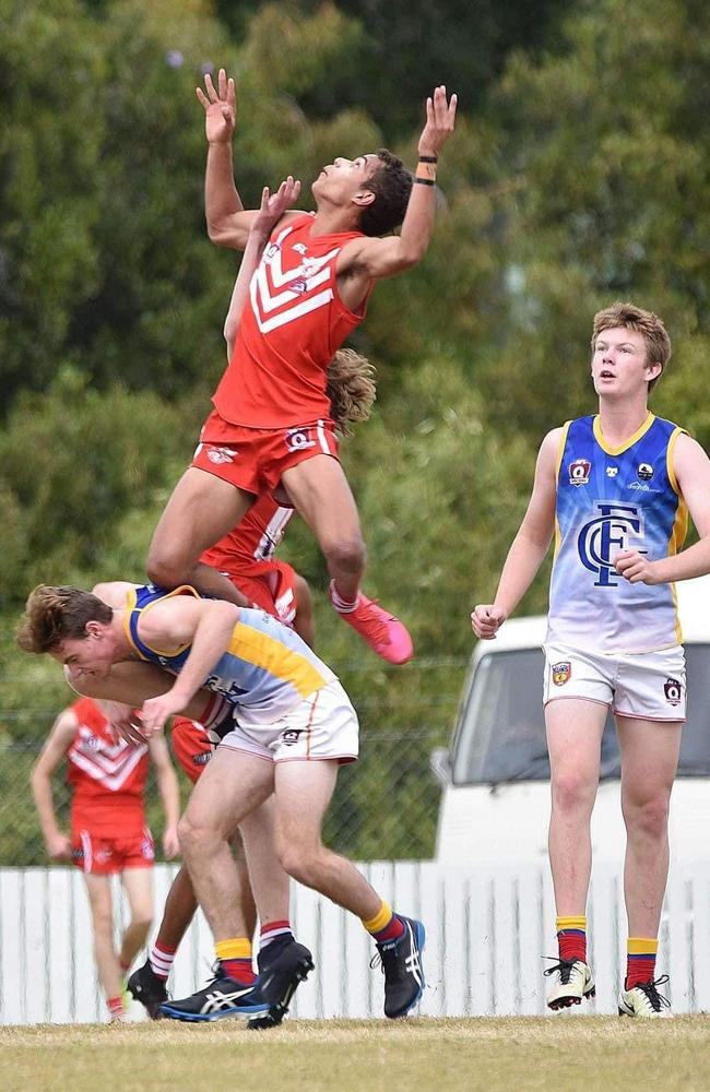 Matt Hill flies high for the Yeppoon Swans, displaying the kind of skills that have seen him signed by AFL club Hawthorn.