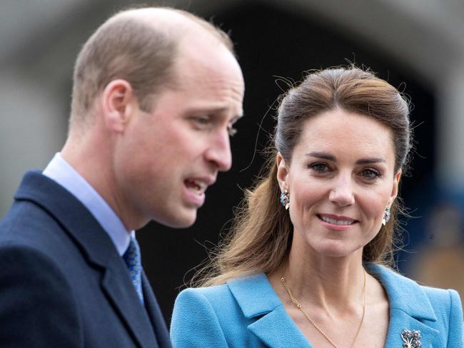 Britain's Prince William, Duke of Cambridge and Britain's Catherine, Duchess of Cambridge attend a Beating Retreat by The Massed Pipes and Drums of the Combined Cadet Force in Scotland at the Palace of Holyroodhouse in Edinburgh, Scotland on May 27, 2021, the final day of their week-long visit to the country. (Photo by Jane Barlow / POOL / AFP)