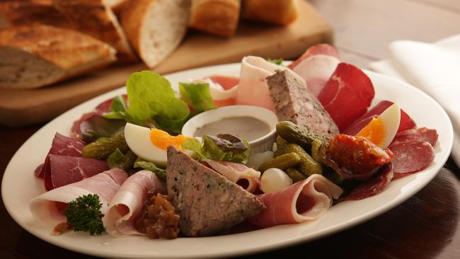 Chicken liver parfait, cured ham, rabbit terrine, saucisson sec with condiments and baguette.