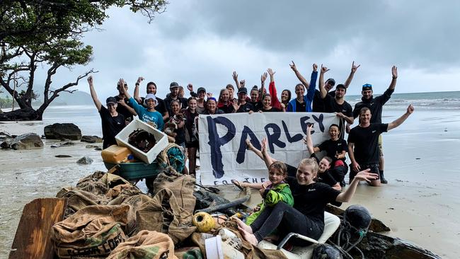 Parley clean up crew with rubbish removed from a beach.