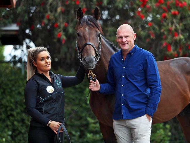 04/11/18 Anthony Mithen is the breeder and part-owner of Melbourne Cup horse Runaway, pictured with trackwork rider Alana Pearson at Gai Waterhouse's stables in Flemington. Aaron Francis/The Australian