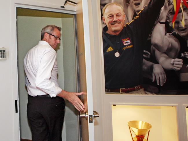 Adelaide Football Club chief executive Steven Trigg retreats to his office after speaking to members of the media at AAMI Stadium the day after the AFL Commission hearing over the Kurt Tippett saga.