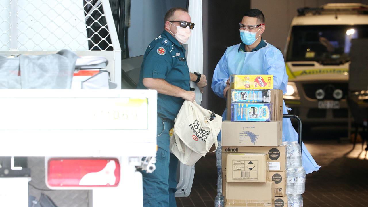 Guests in quarantine at Hotel Grand Chancellor getting transported in ambulances to The Westin and Four Points in Brisbane City. Pics Tara Croser.