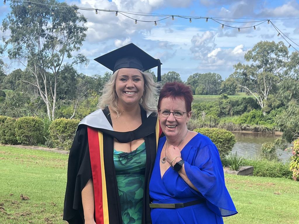 Graduates from the University of the Sunshine Coast's Fraser Coast campus celebrating at the Brolga Theatre.