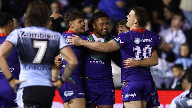 SYDNEY, AUSTRALIA - JUNE 07: Adam Pompey of the Warriors celebrates scoring a try during the round 14 NRL match between Cronulla Sharks and New Zealand Warriors at Sharks Stadium on June 07, 2025 in Sydney, Australia. (Photo by Jason McCawley/Getty Images)