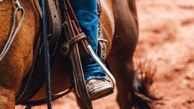 Close-up of boots in the horse's stirrup. Picture: istock