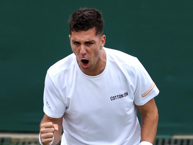 LONDON, ENGLAND - JULY 03: Thanasi Kokkinakis of Australia celebrates as he plays against Felix Auger-Aliassime of Canada in his Gentlemen's Singles first round match during day three of The Championships Wimbledon 2024 at All England Lawn Tennis and Croquet Club on July 03, 2024 in London, England. (Photo by Clive Brunskill/Getty Images)