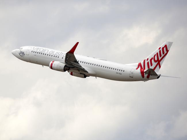 SYDNEY, AUSTRALIA - NewsWire Photos OCTOBER 08, 2020 - A Virgin Australia plane takes off at Sydney Airport on Thursday October 08, 2020.Picture: NCA NewsWire / Christian Gilles