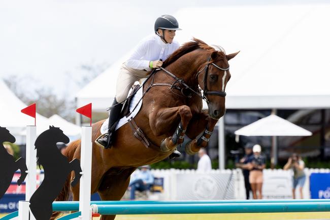 Ally Mowley competing in the Magic Millions Showjumping and Polo. Picture by Luke Marsden.