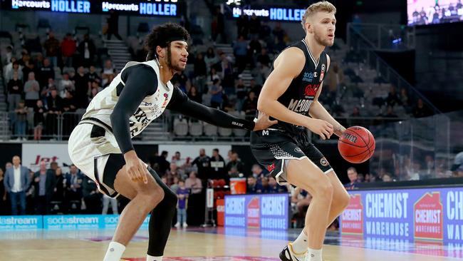 Melbourne United guard Mitch McCarron has lifted the lid on the team’s selfless culture that has the NBL ladder leaders on the cusp of history, chasing a club record 12 straight wins if they beat Perth on Wednesday night. Photo: Kelly Defina/Getty Images.